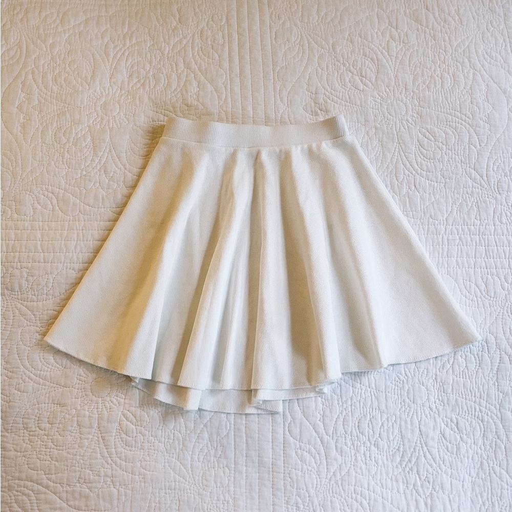 Indah Sail Solid Tennis Skirt in Chalk White (Pleated) size 0